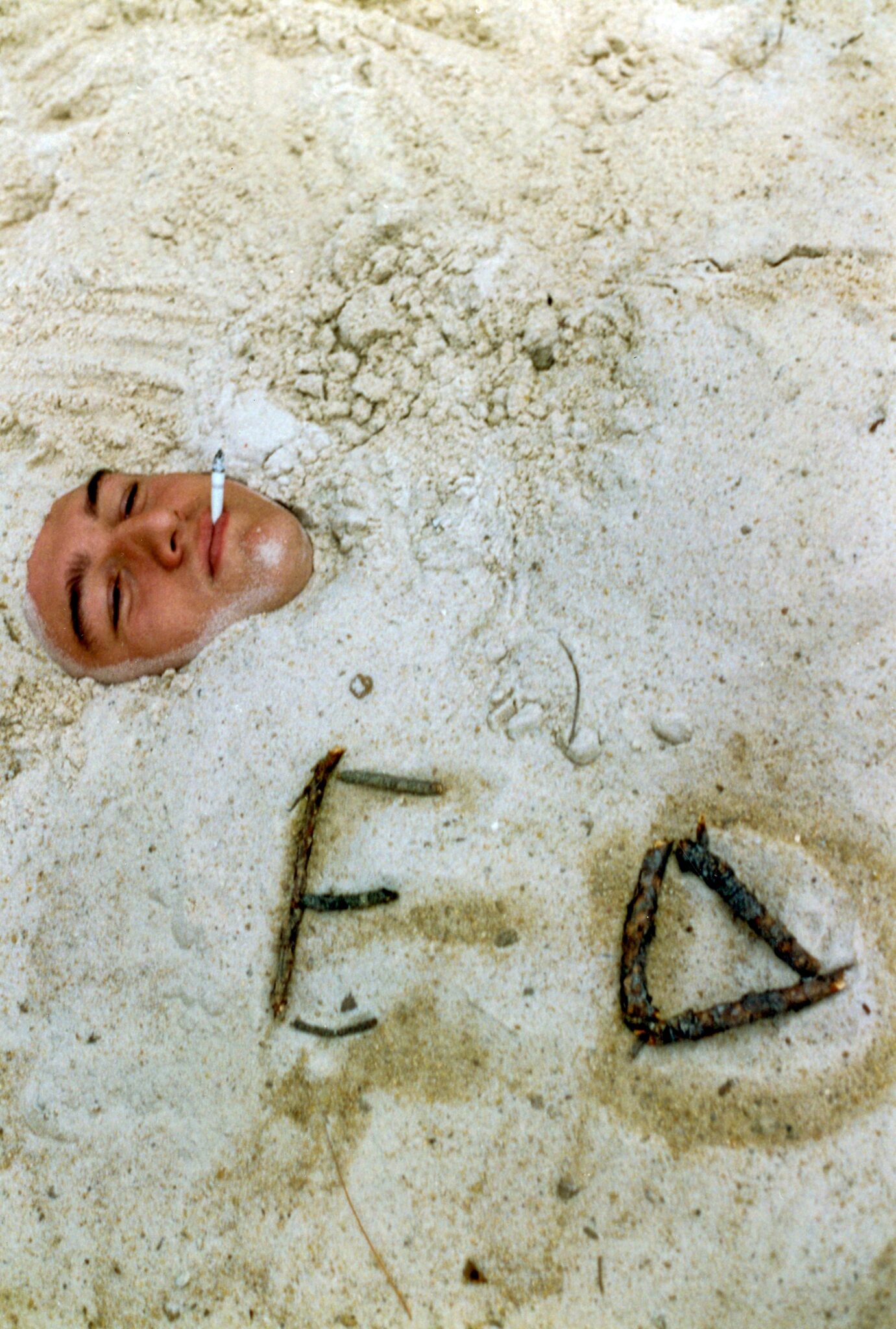 Ed Smith Buried in Volleyball Court 1992